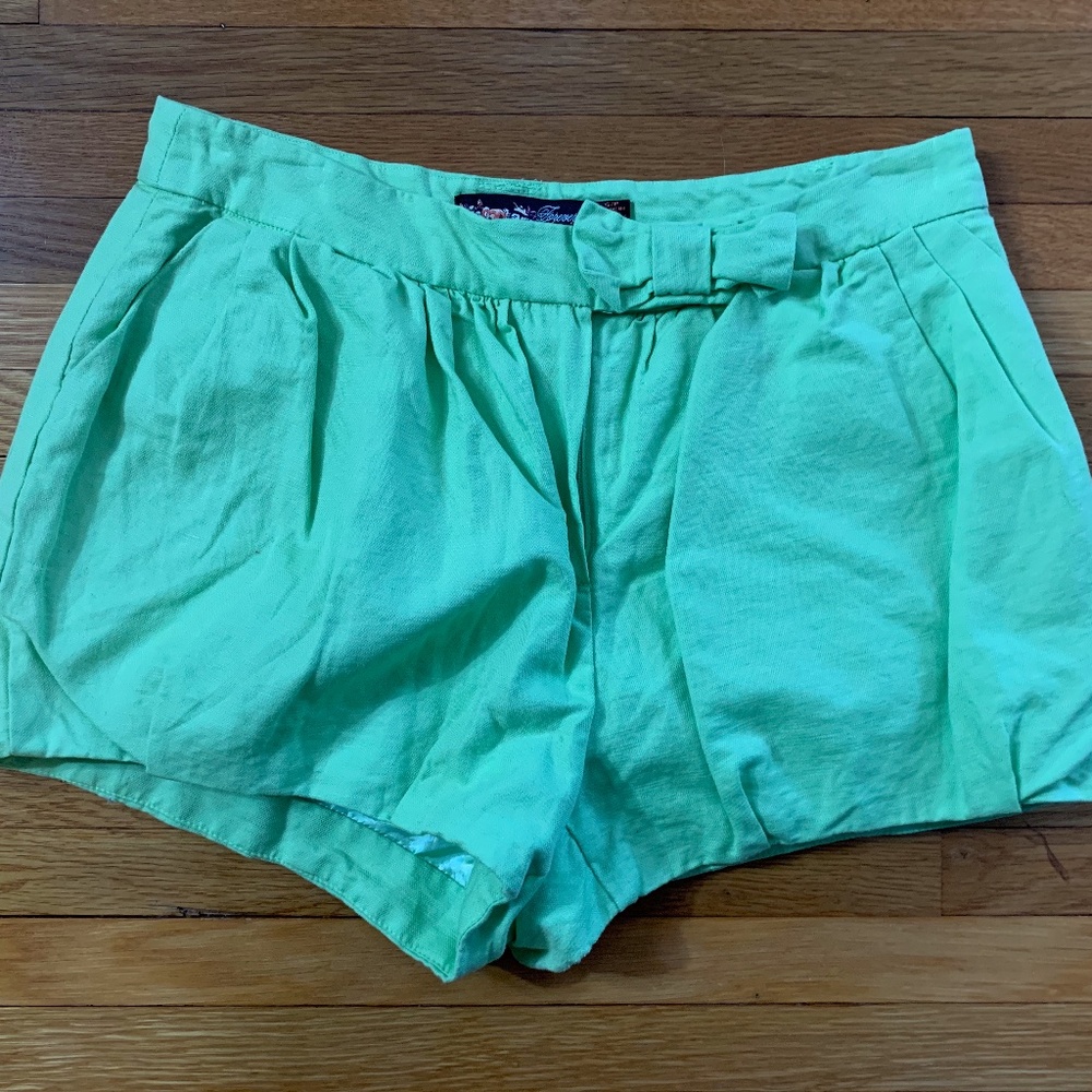 green shorts